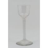 George III opaque twist wine glass, circa 1765, ogee bowl with flute moulded base,