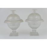 Pair of early 19th Century cut glass covered jars,