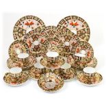 Royal Crown Derby Imari tea service, circa 1894, pattern number 2451, comprising nine cups,