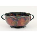 William Moorcroft Pomegranate twin handled bowl, green painted signature,