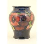 William Moorcroft Pansies vase, of inverted baluster form with a deep cobalt blue ground,