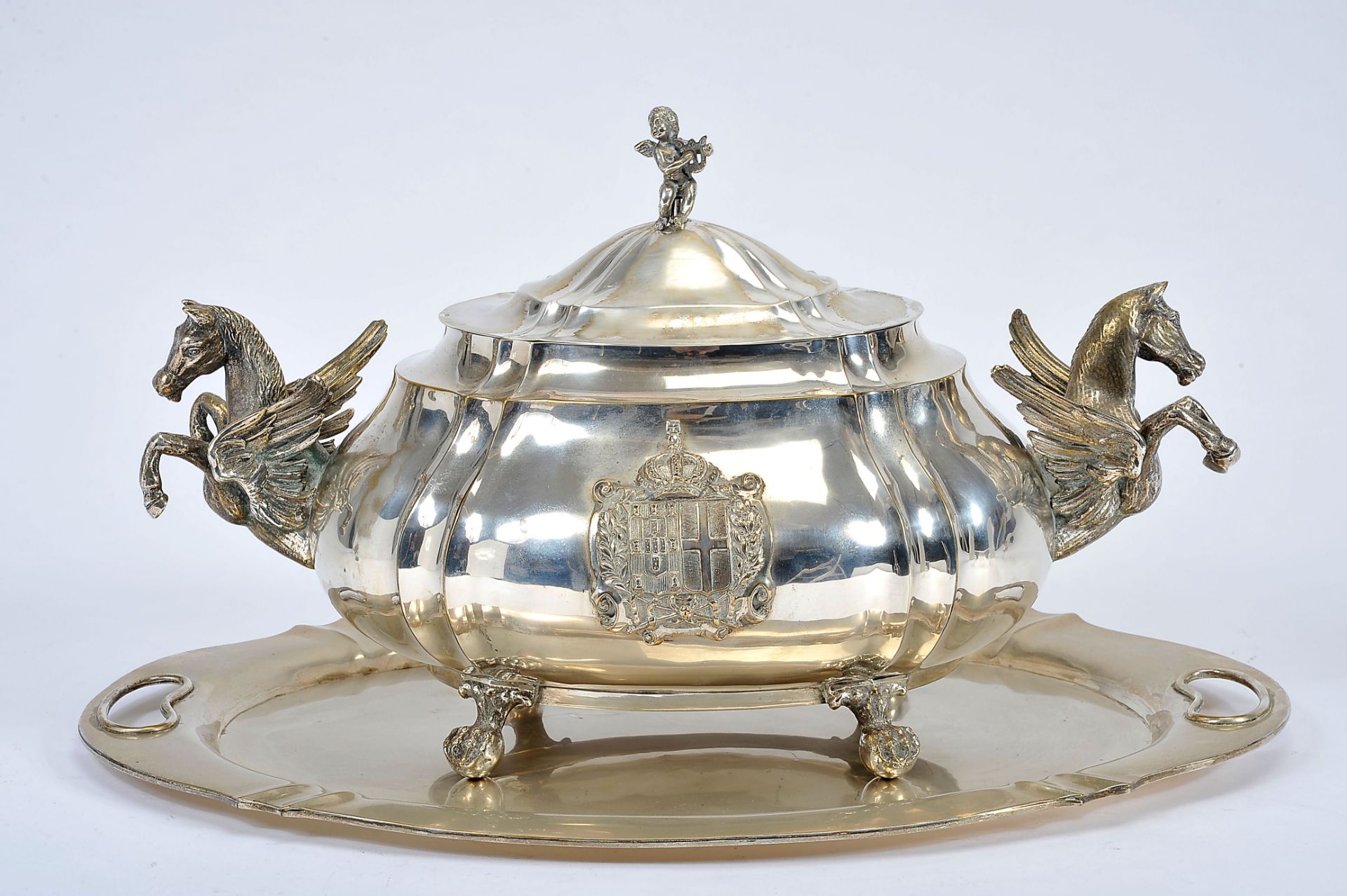 A Tureen with Stand, silver metal, cover's finial and handles en relief "Putto" and "Pegasos",