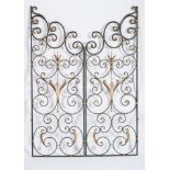 A Pair of Gates, painted and gilt wrought iron, Portuguese, 20th C., signs of use, Dim. - (cada) 165