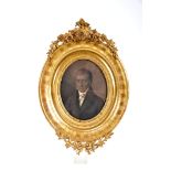 Portrait of a Gentleman, charcoal and gouache on paper, gilt wooden and plaster frame en relief,