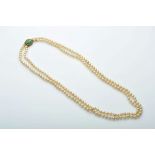 A Pearl Necklace, string of culture pearls (6~7 mm), 800/1000 gold clasp, set with rose cut diamonds