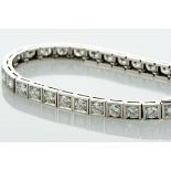 A Bracelet, 800/1000 gold and 500/1000 platinum, set with 32 brilliant cut diamonds with the