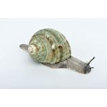 LUIZ FERREIRA - 1909-1994, A Snail, 833/1000 silver sculpture, sea snail shell application,