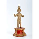 The Child Jesus, polychrome and gilt wooden sculpture, painted and gilt wooden stand, silver