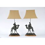 A Pair of Table Lamps "Oriental figures and dromedaries", Napoleon III, a pair of patinated antimony