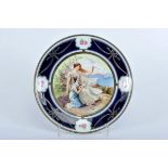 A Decorative Dish, Vienna porcelain, polychrome decoration "Female figures by the lake", blue