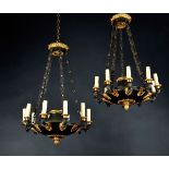 A Pair of Ten-light Chandeliers, restauration style, gilt and patinated bronze, chiselled decoration