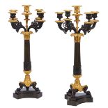 A Pair of Five-light Candelabra, restauration, gilt bronze “à patine brune", chiselled decoration en