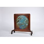 A Fire Screen, polychrome cloisonné metal central medallion "Landscape with cranes, deer and