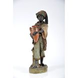 A Blackamoor, terracotta sculpture, polychrome decoration, Austrian, 19th/20th C., small chip at the