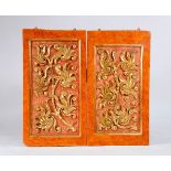 A Pair of Panels, marbled and gilt carved wood, Portuguese, 17th C./18th. C., restoration, minor