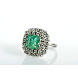 A Ring, 800/1000 white gold, set with emerald with the approximate weight of 1.90 ct. and 34