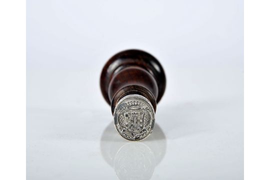 A Signet, turned exotic wooden handle, silver imprint seal engraved with the coat of arms of the