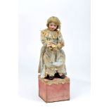 Automaton "Doll sewing a teaddy bear", polycome biscuit head and hands, papier-mâché body, natural