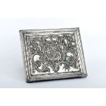 A Missal Stand, wood fully lined with silver metal alloy sheet, engraved decoration en relief