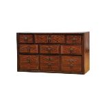 An nine-drawer Cabinet, mannerist, walnut and oak, front of the drawers with Brazilian rosewood