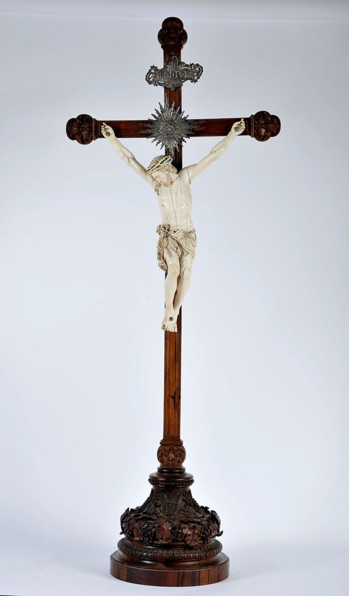 Crucified Christ, ivory sculpture, Brazilian rosewood later stand and cross with carvings and silver
