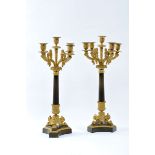 A Pair of Five-light Candelabra, Bourbon Restoration, "à patine brun" and gilt bronze, carved