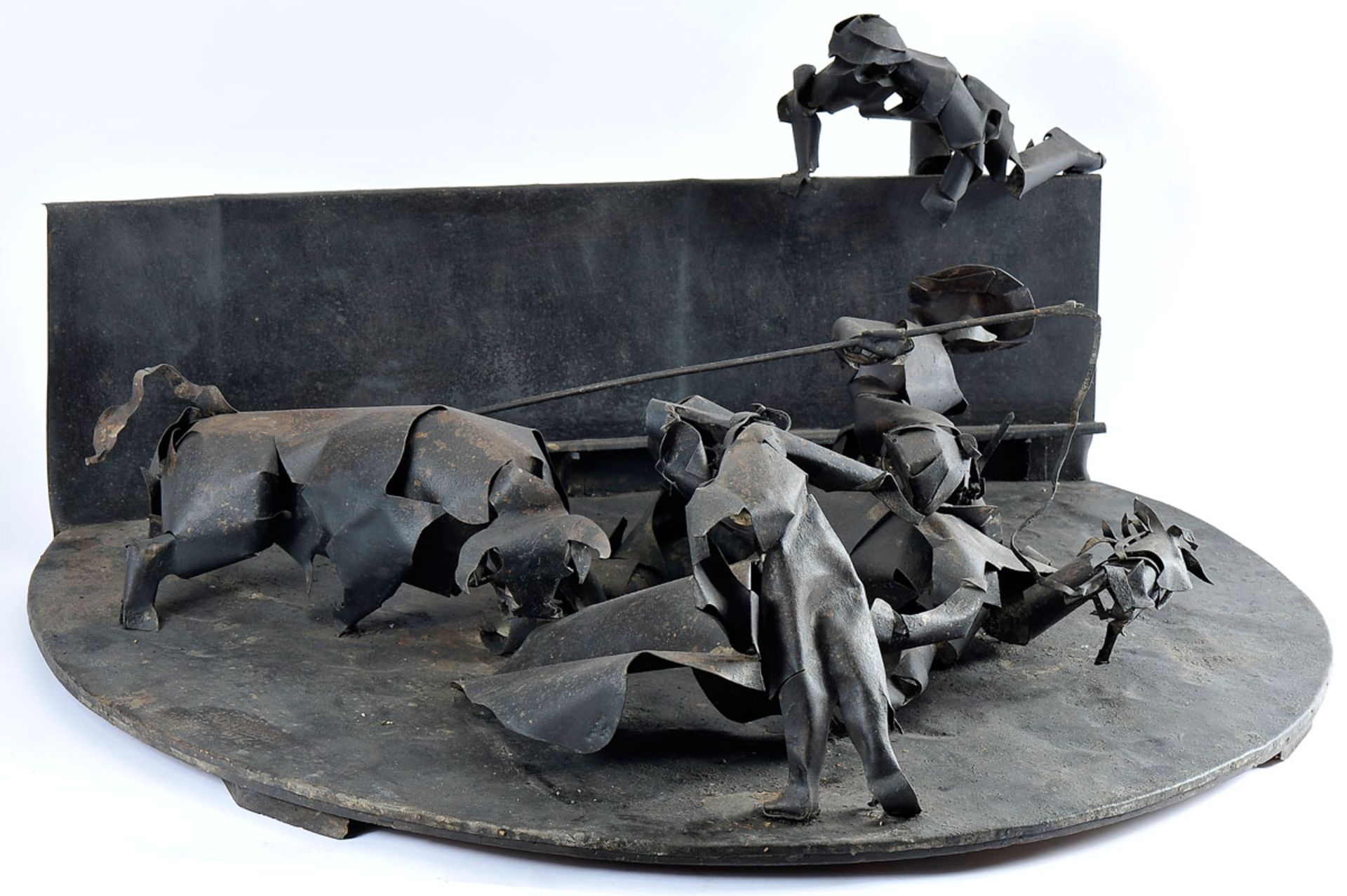 DELFIM MAYA - 1886-1978, A colhida do picador, scalloped iron sheet sculpture, rusty, small bruises,
