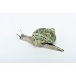 LUIZ FERREIRA - 1909-1994, A Snail, 833/1000 silver sculpture, sea snail shell application,