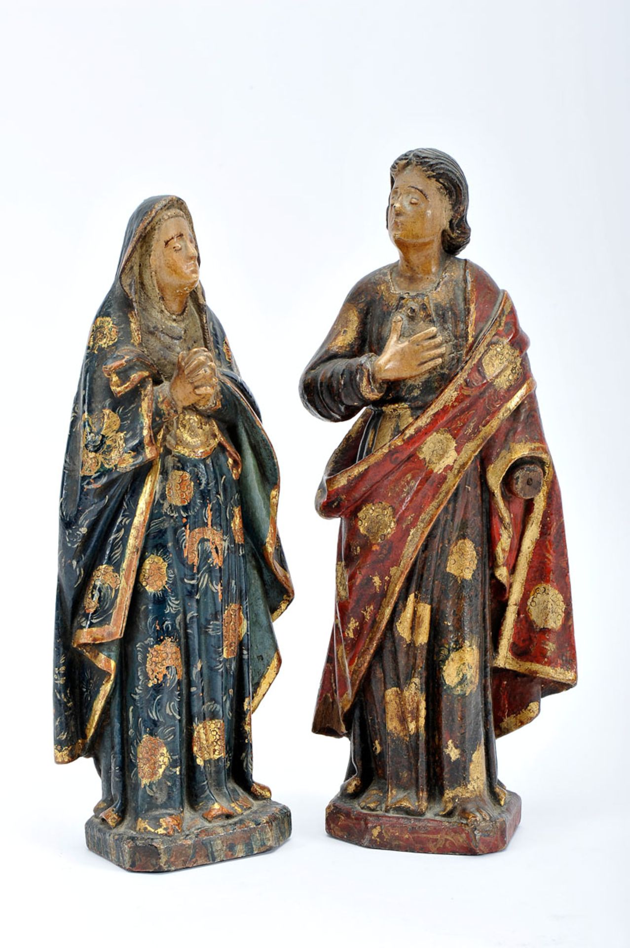 Our Lady and Saint John of Calvary, a pair of gilt and polychrome wooden sculptures, Portuguese,