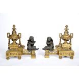 A Pair of Chenets/Andirons, Louis XVI style, «à patine verte» gilt bronze en relief "Putti and