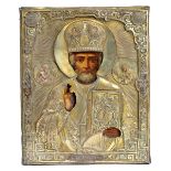An Icon - Saint Nicholas, oil on wood, gilt metal Oklade en relief, Russian, 19th C. (2nd half),