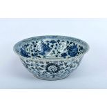 A Large Bowl, Chinese porcelain, blue decoration "Flowers", Chinese, 19th C., minor faults on the