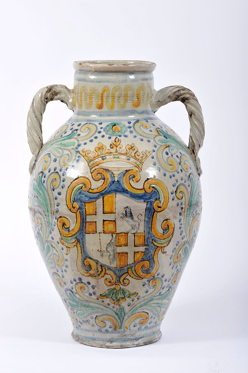 A Large Vase with two Handles, faience probably from Talavera, polychrome decoration with the coat