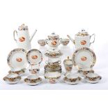 A Tea and Coffee Set, Chinese export porcelain, polychrome and gilt decoration "Flowers and Fruits",