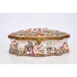 A Large Scalloped Box, Capodimonte porcelain, polychrome and gilt decoration en relief "allegory