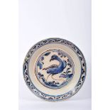 A Dish, faience, blue and vinous «beads» decoration "Bird", Portuguese, 17th C. (2nd half), broken