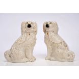 A Pair of Hounds, Staffordshire stone powder sculptures, polychrome and gilt decoration, English,