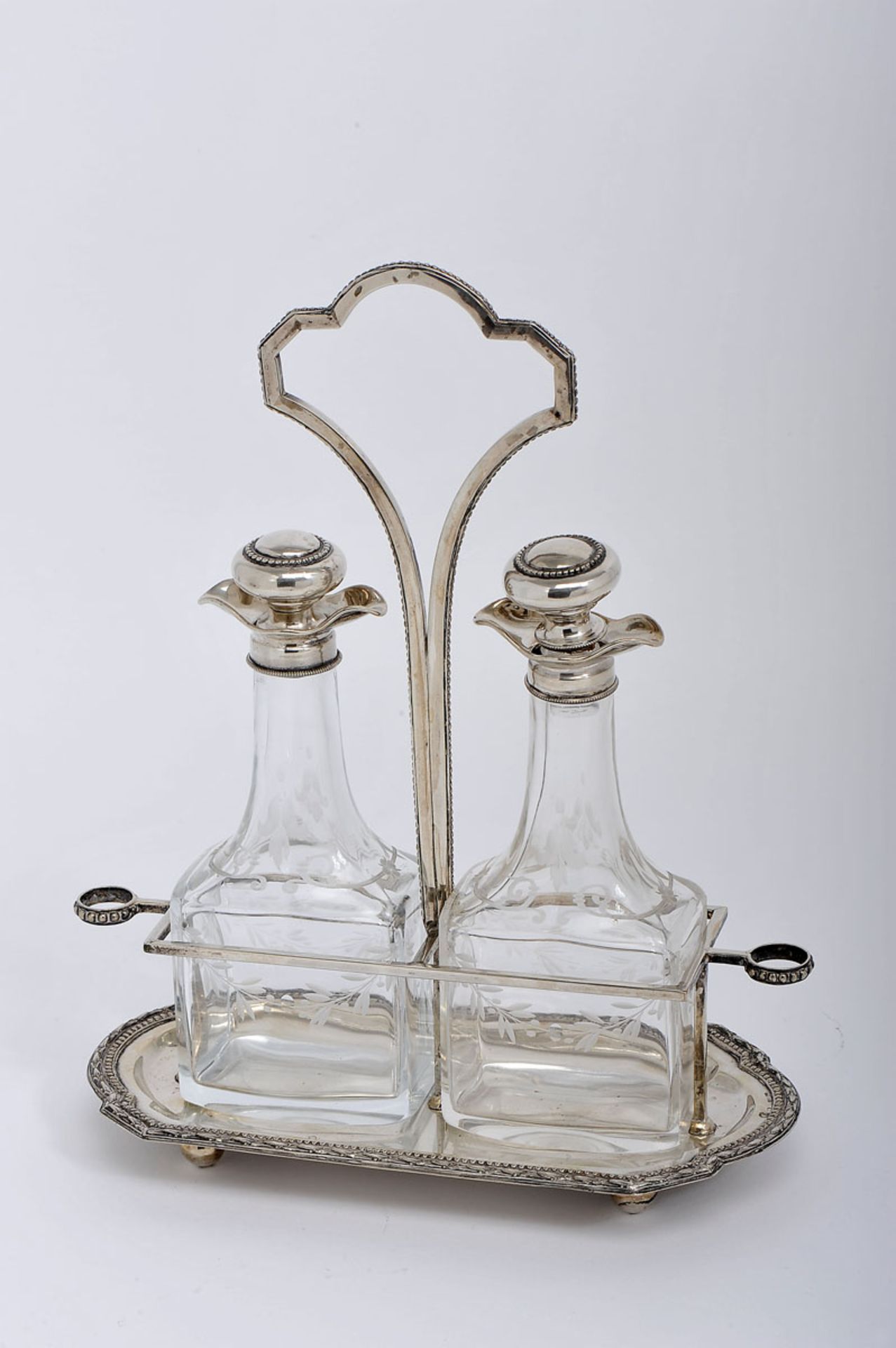 A Cruet, 833/1000 silver, friezes en relief, glass cruets with frosted decoration and silver rims