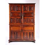 A Glassware Cupboard, mannerist, Brazilian rosewood, padded doors and sides, iron mounts, interior