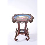 A Guéridon, Napoleon III, burr-mahogany veneer, tops with painted and gilt porcelain plaques