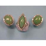 A pair of jade and diamond ear-clips, and matching marquise ring, claw settings, ring size M
