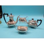 A silver four-piece teaset, bulbous form on scroll legs, wood handles and finials, approx. 49oz.