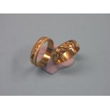 Two 9ct. gold band rings, each with engraved detail, sizes S/T and Q/R, 4.5 grams total