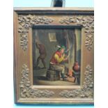 A 19th century oil on copper panel, domestic interior with seated clay pipe smoker at hearth,