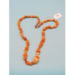 An amber-type bead necklace