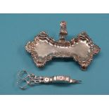 A George II cast silver snuffer tray, rococo-design with scroll handle, on four scroll feet,