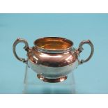 A Victorian silver sugar bowl, bulbous two-handled form, London 1869, approx. 5.75oz.