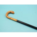 An horn-handled ebony walking stick 40in.