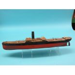 An early 20th century model coastal freighter, black hull, red beneath the waterline, features