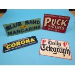 Four enamel advertising signs, including Daily Telegraph, 1d, and a printed Borough of Brighton
